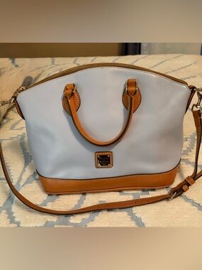 Light blue Dooney and Bourke leather purse. Leather.  Nice. Read more please.